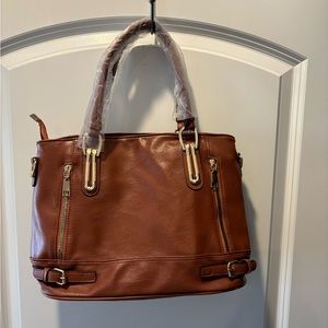 Brand new, soft cognac purse.